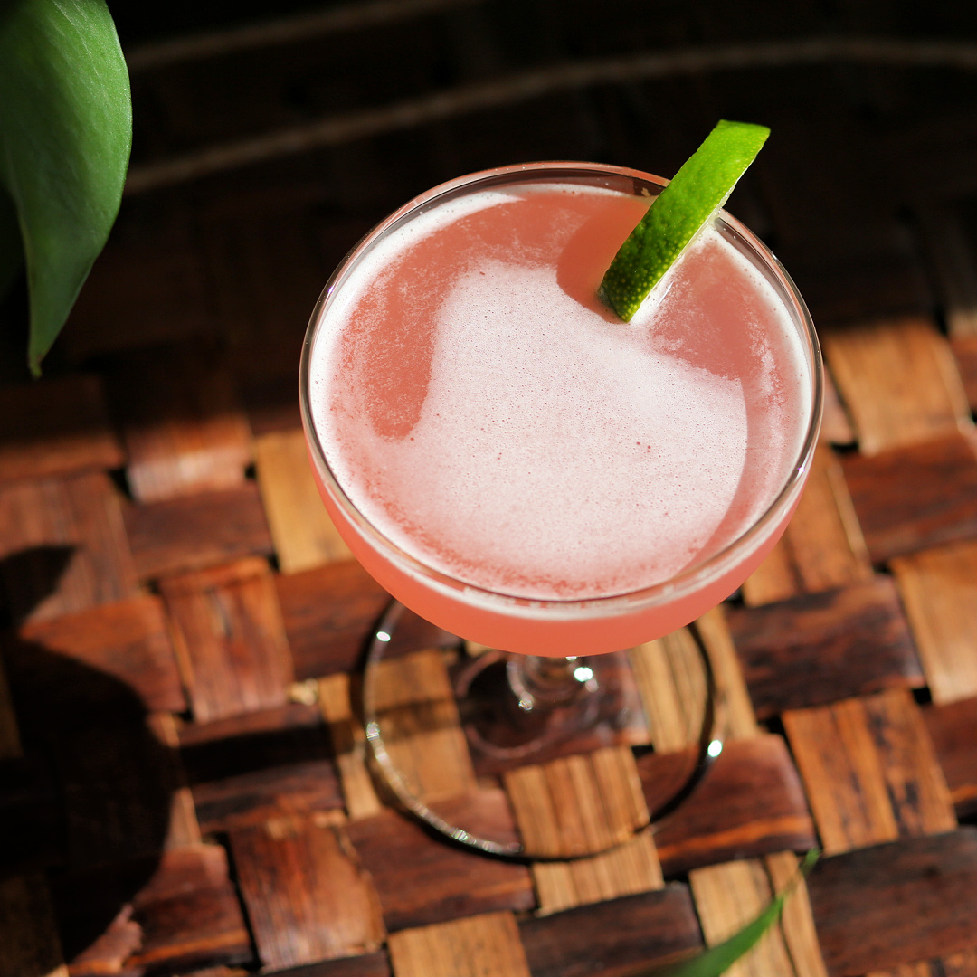 rhubarb daiquiri with a lime garnish