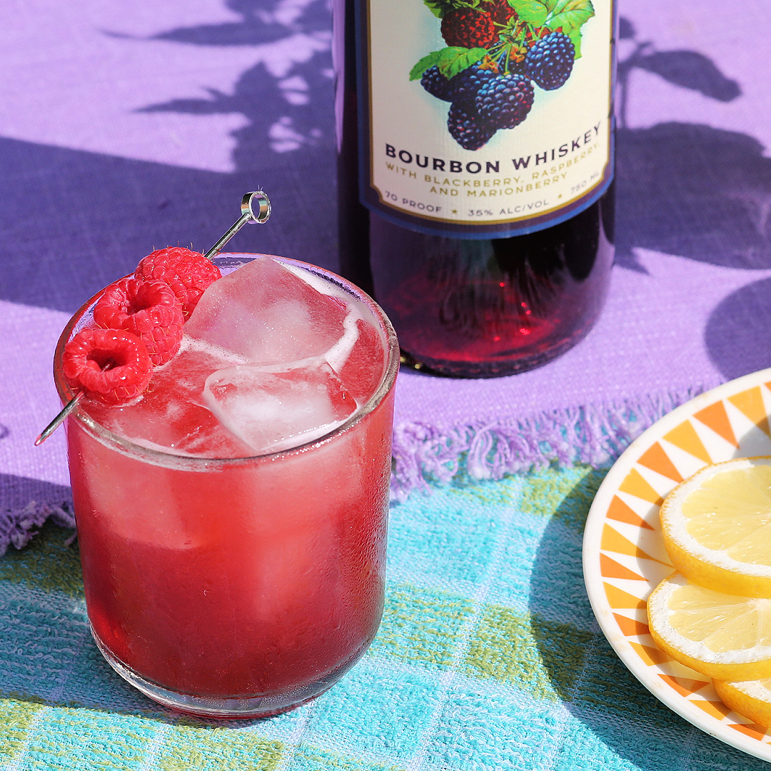 sauvie island bramble with raspberries and new deal brambleberry bourbon whiskey