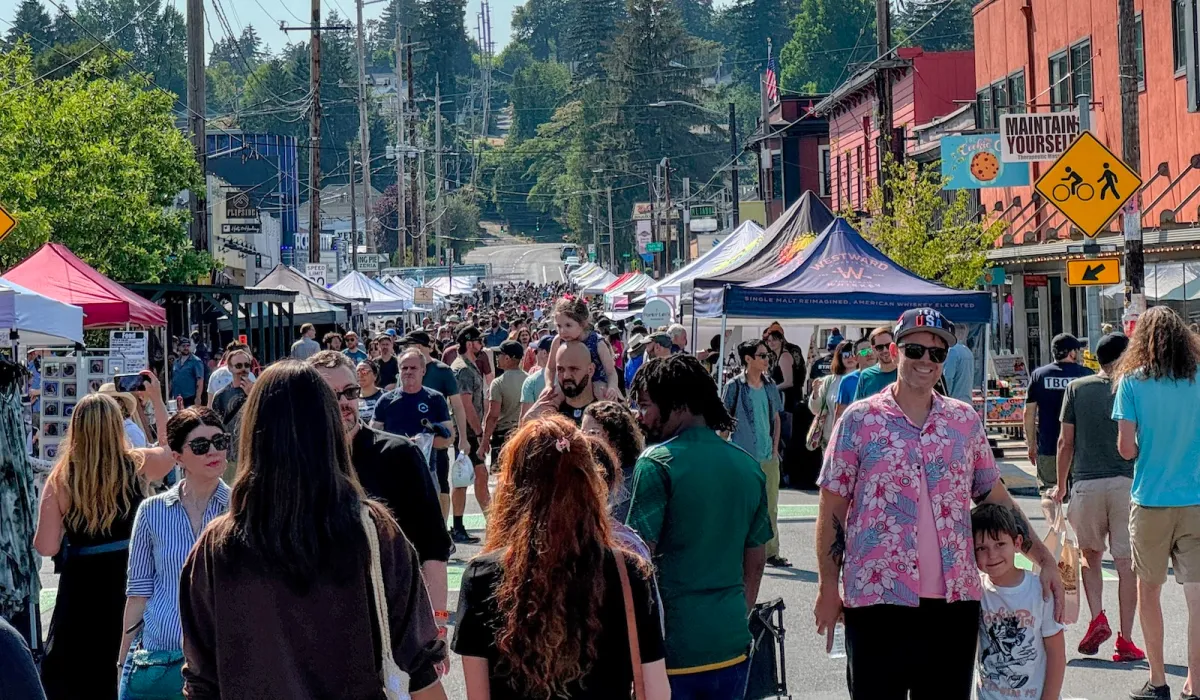 Attendees and booths at Montavilla Street Fair