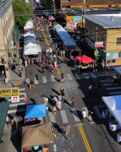 Booths and crowds for Belmont Street Fair