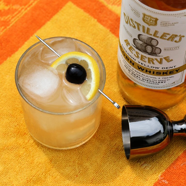 sunshine sour with cherry garnish